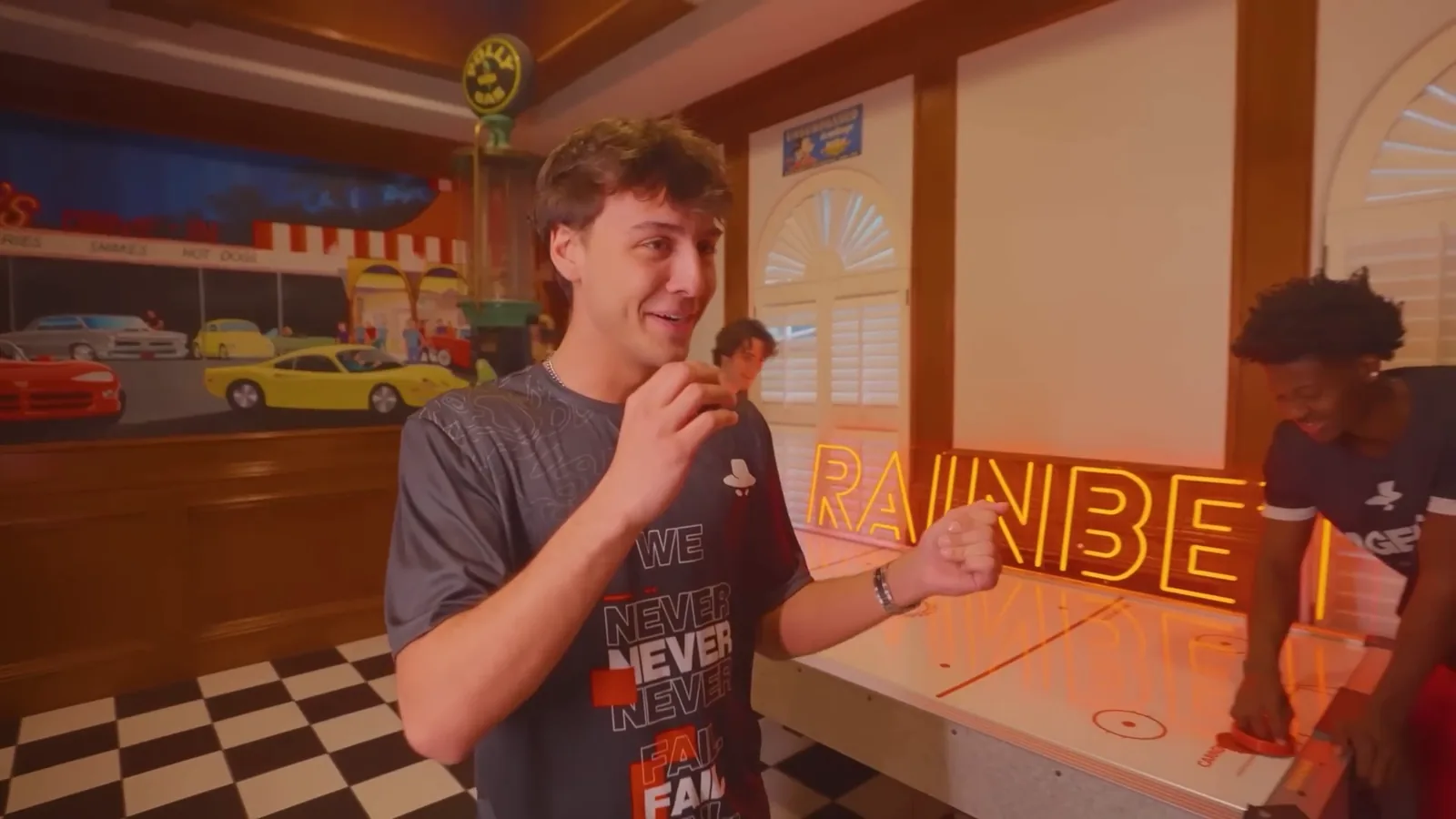 Branded game room activation inside a previous Agent team house